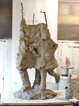 starting to put the clay on the armature