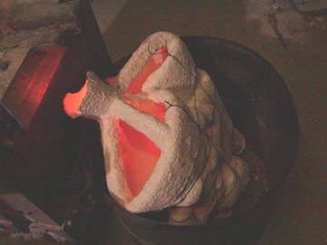 molten bronze in the shell